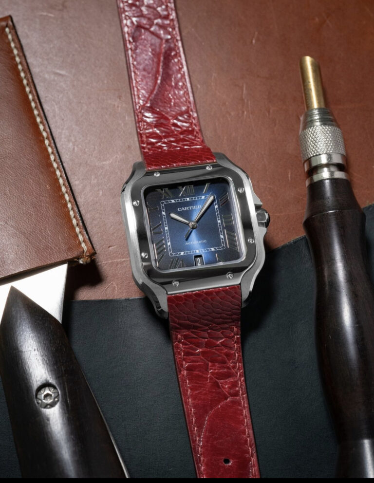 Custom ostrich leg strap in vibrant red strap on Cartier