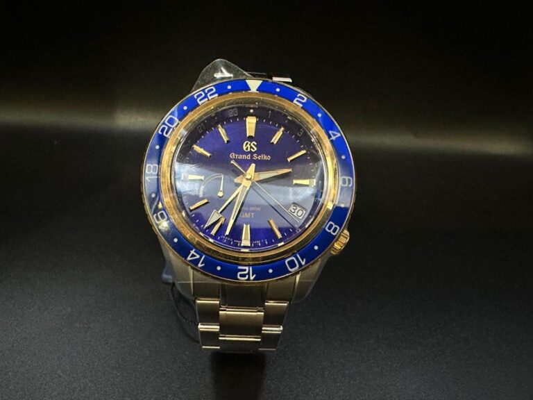 Grand Seiko Spring Drive GMT steel/ gold blue