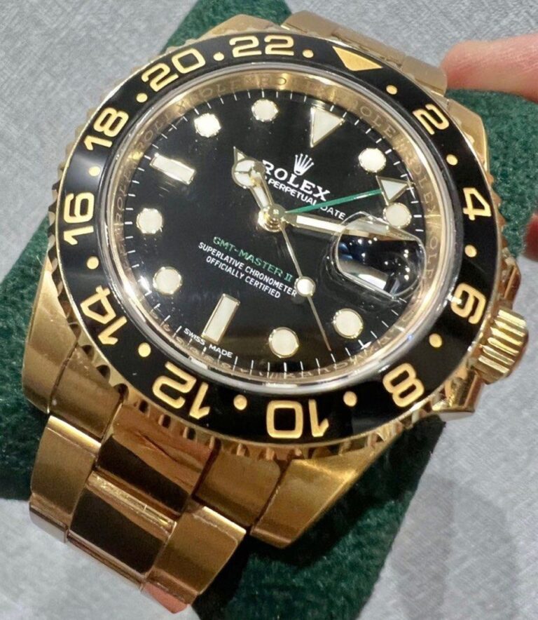 Preowned Y2019 Rolex GMT Master II Black Yellow Gold 116718LN
