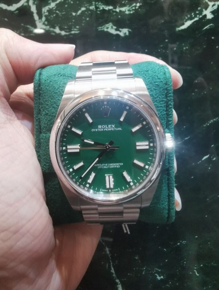 Dec 2022 Rolex Oyster perpetual OP 41mm green 124300