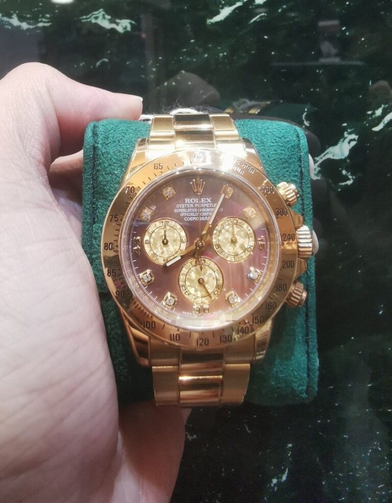 Rolex Daytona full yellow gold black mother of pearl diamond dial 116528