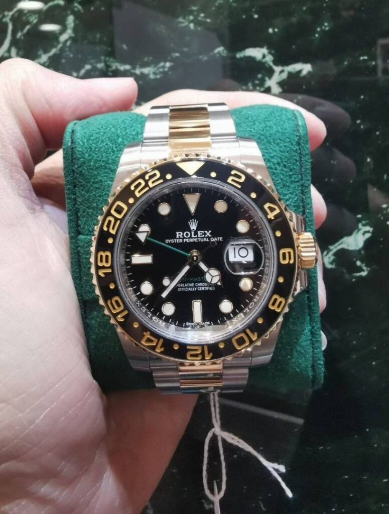 March 2018 Rolex GMT master 2 half gold black dial ceramic 116713ln