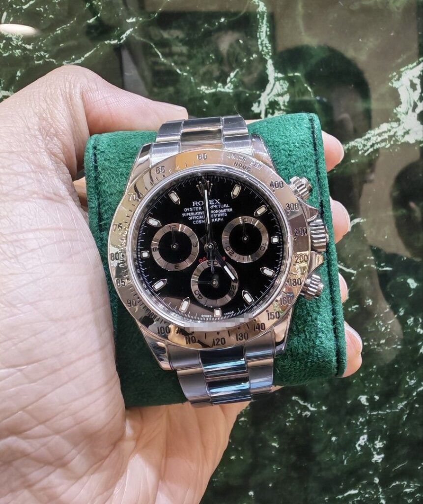 Blue lume Rolex Daytona steel black dial oyster 116520