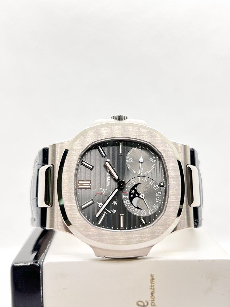 Pre Owned Patek Philippe Nautilus 5712G-001 Grey Dial Automatic White Gold Casing Leather ( Jan 19 )