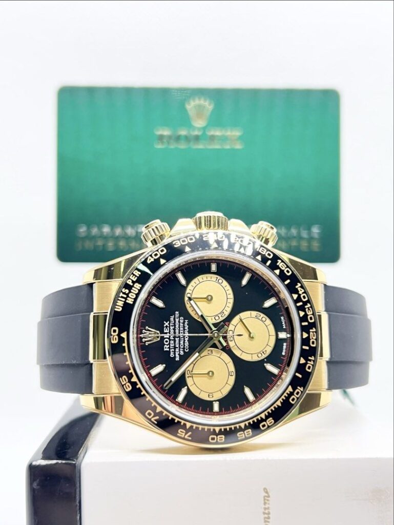 Pre-Owned Rolex Oyster Daytona 126518LN “Paul Newman” Black Dial Automatic Yellow Gold Casing Rubber ( Oct 24 )