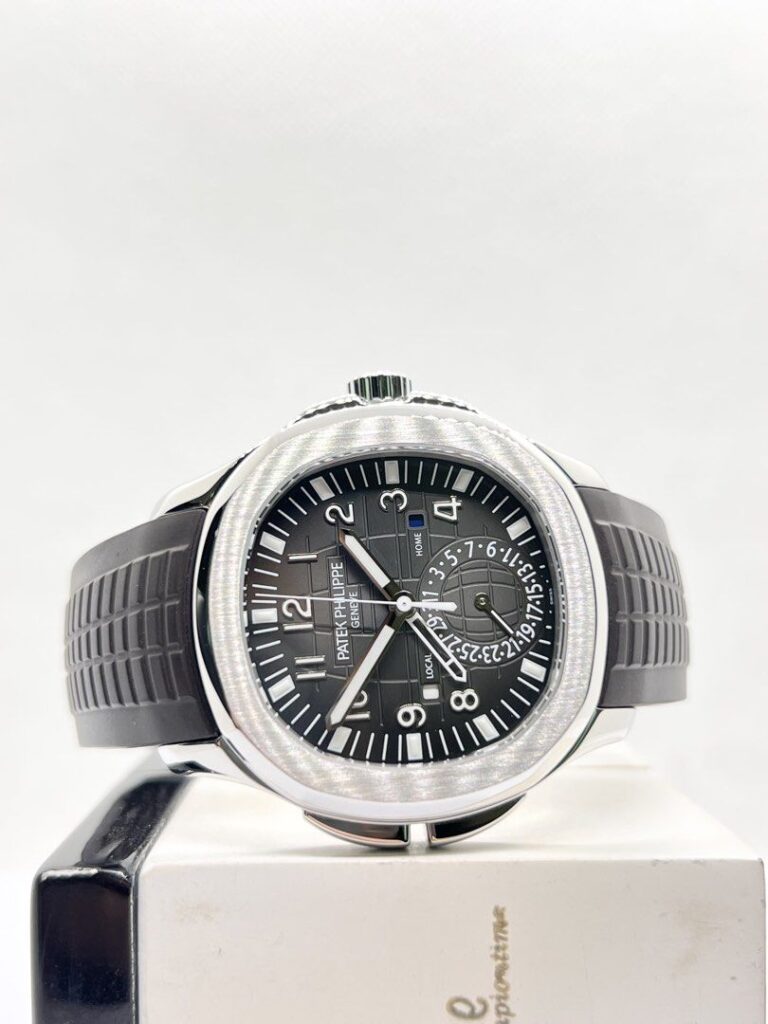 Pre Owned Patek Philippe Aquanaut Travel Time 5164A-001 Black Dial Automatic Steel Casing Rubber ( Apr 15 )