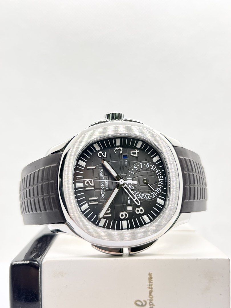 Pre Owned Patek Philippe Aquanaut Travel Time 5164A-001 Black Dial Automatic Steel Casing Rubber ( Apr 15 )