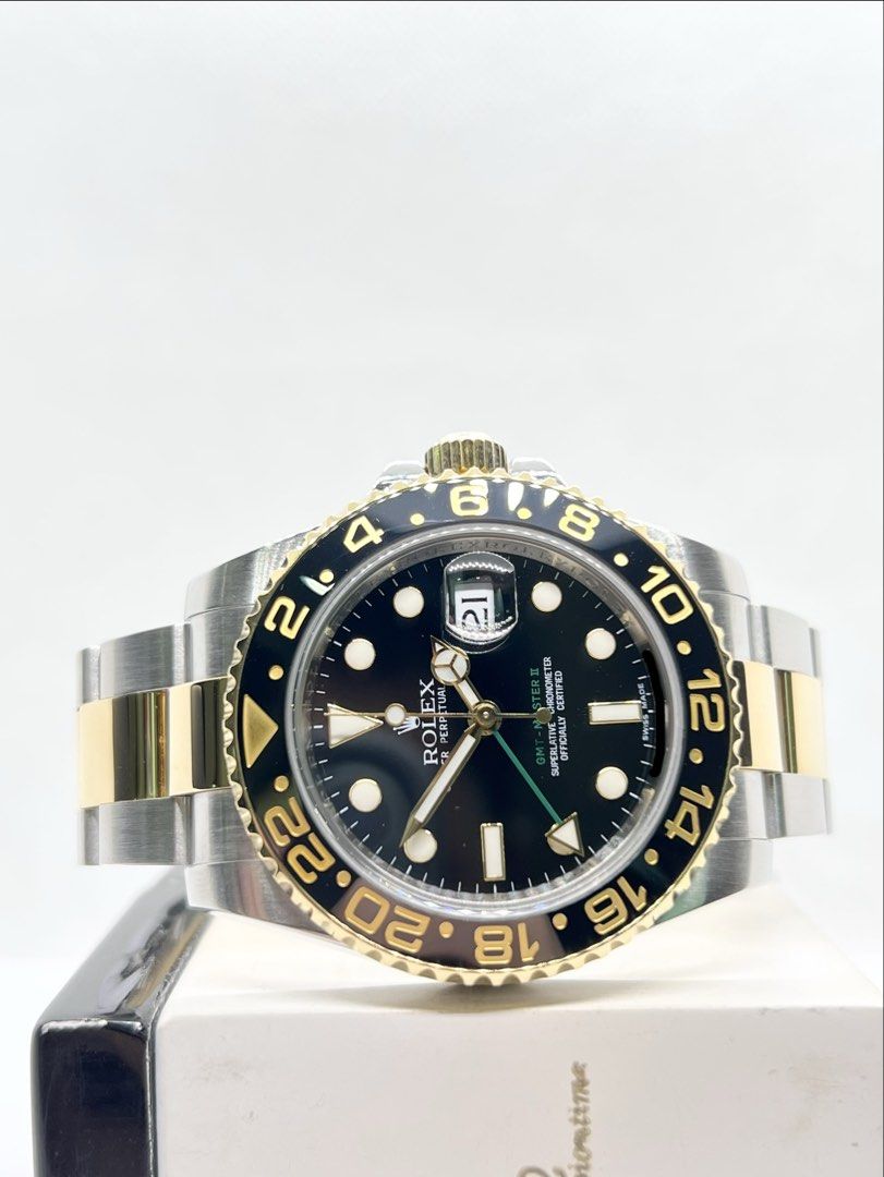 Pre Owned Rolex Oyster Gmt Master II 116713LN Black Dial Automatic Steel Casing Bracelet ( June 11 )